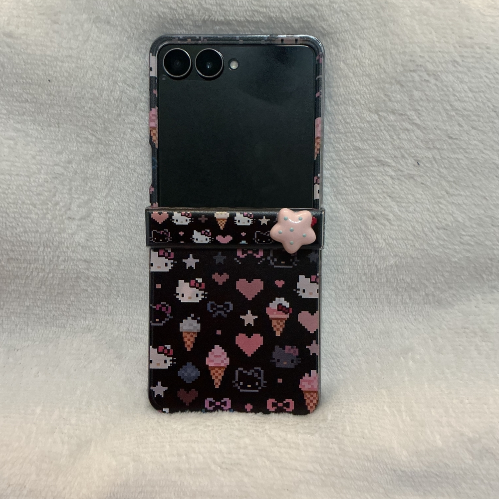 Galaxy Z Flip 7 Hello Kitty Black & Pink Pattern Case with Star Charm
